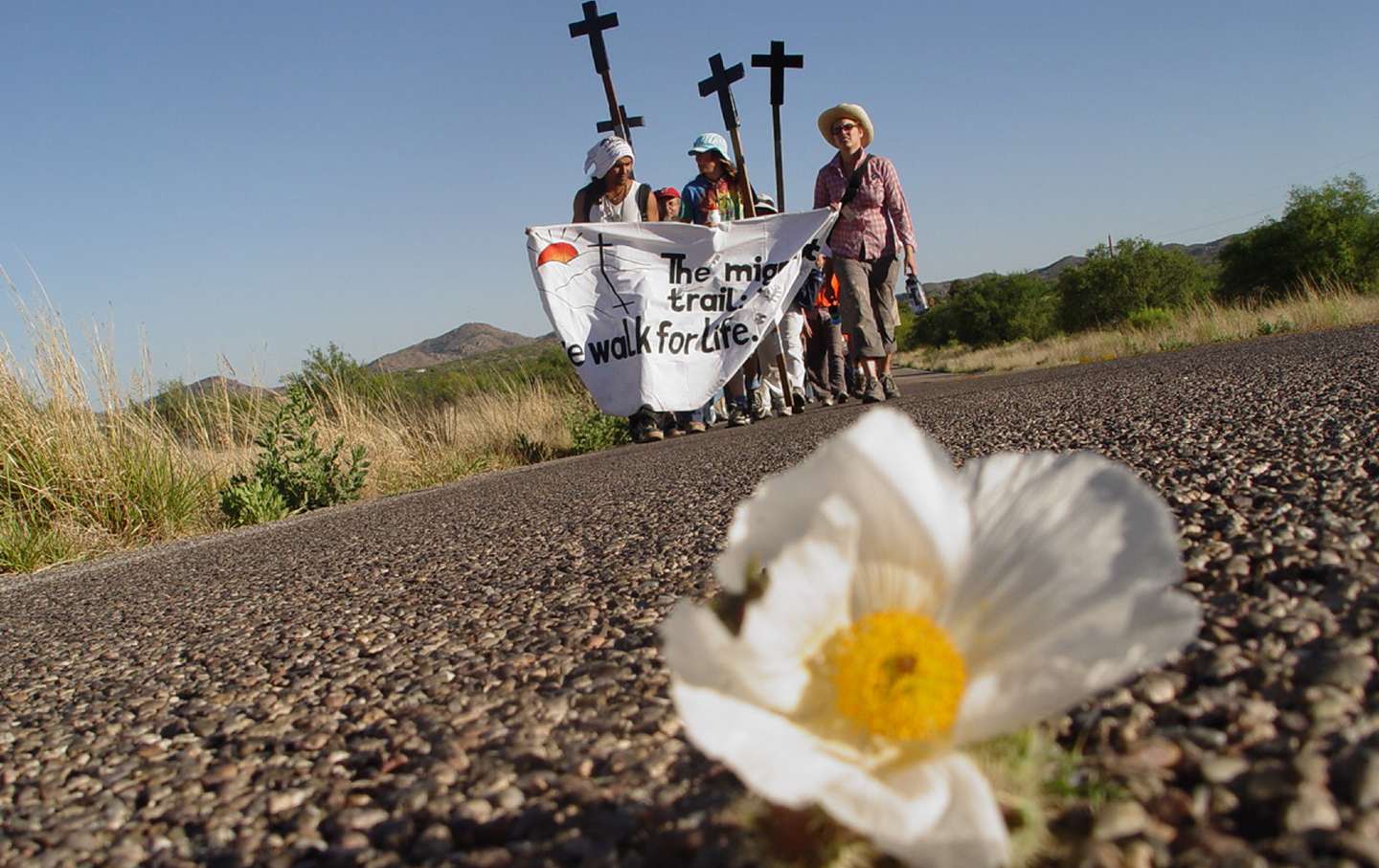US and Mexican immigrant rights activists march through the Arizona desert to draw attention to unjust immigration policies.