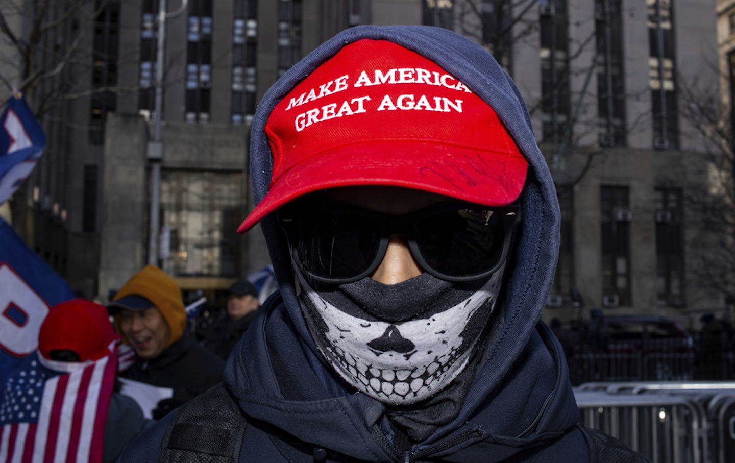 A pro-Trump protester outside the Manhattan Criminal Courthouse, where Trump was given an unconditional discharge in January 2025.
