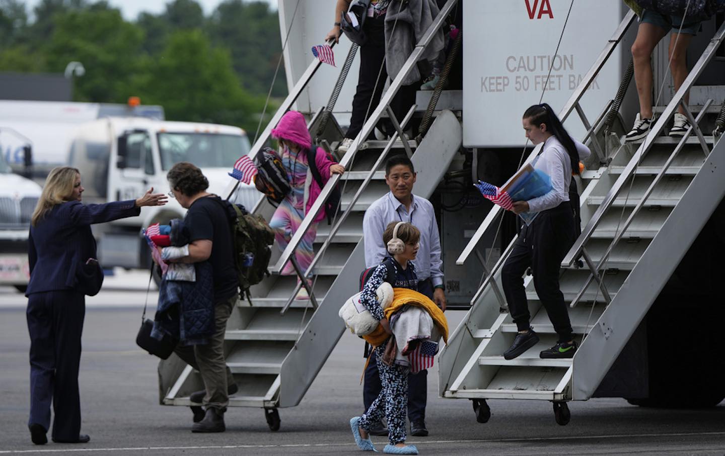 Afrikaners from South Africa arrived Monday, May 12, 2025, at Dulles International Airport.