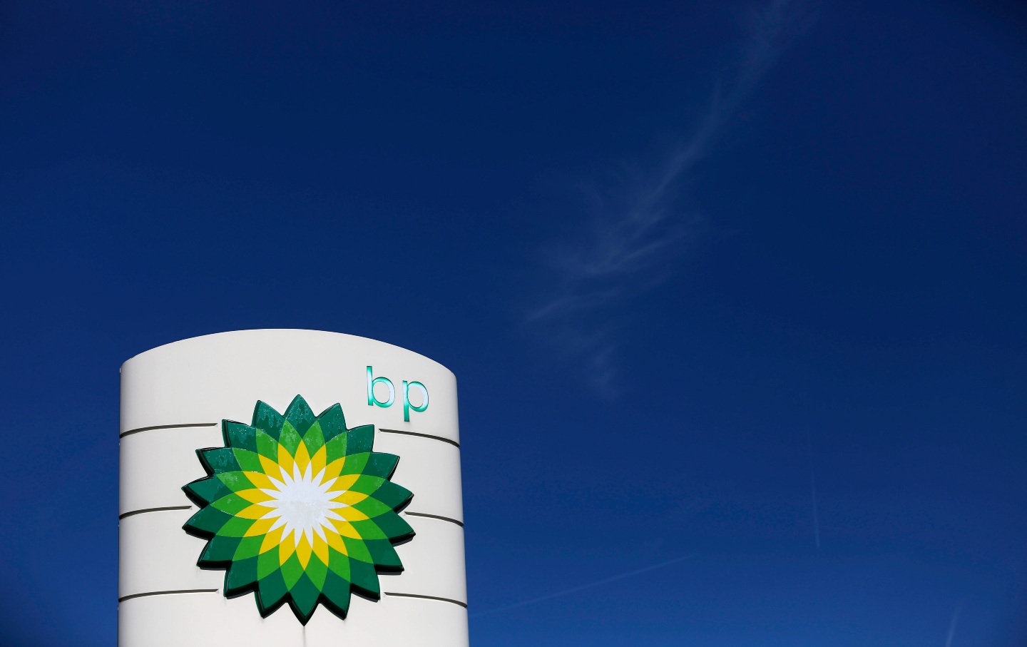 A BP company logo sits on display on the forecourt of a gas station.