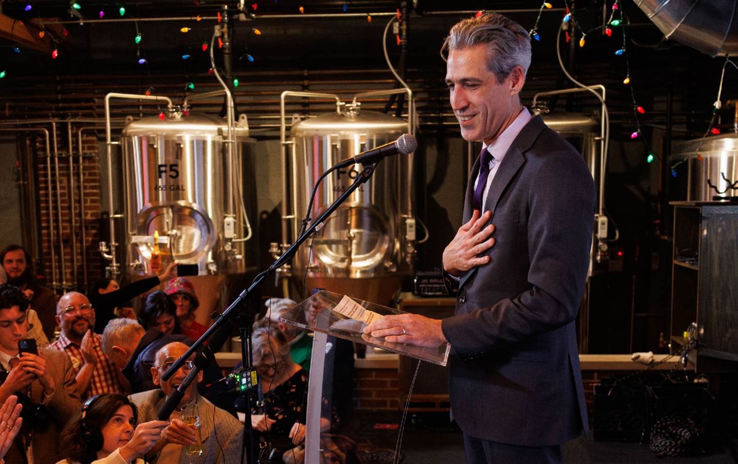 Evanston Mayor Daniel Biss speaks to supporters after celebrating the Democratic nomination in the Ninth Congressional District race during an election night watch party on March 17, 2026, in Evanston, Illinois.