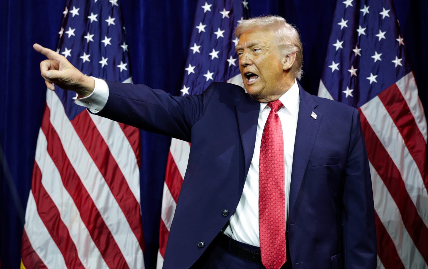 Donald Trump departs after speaking during a House Republican retreat at The John F. Kennedy Center for the Performing Arts on January 6, 2026, in Washington, DC.