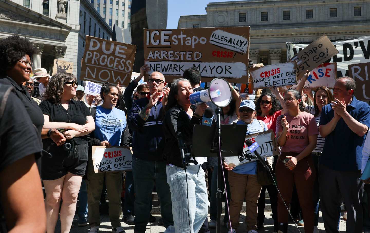 Protesters, activists, and local politicians gather in Lower Manhattan to denounce the arrest yesterday of Newark Mayor Ras Baraka for allegedly trespassing at an ICE facility in New Jersey.