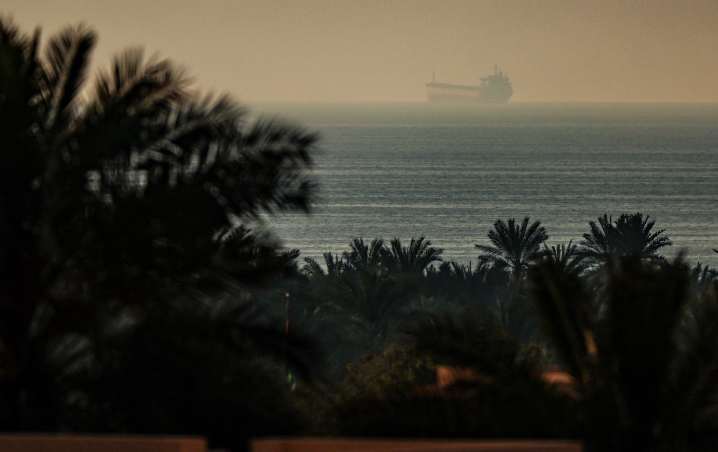 An oil tanker in the Strait of Hormuz as viewed from the town of Al Jeer in the United Arab Emirates, on February 25, 2026.