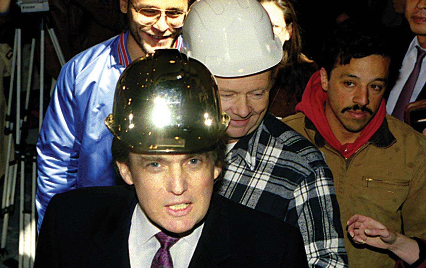 Donald Trump with construction workers at the Trump Palace.