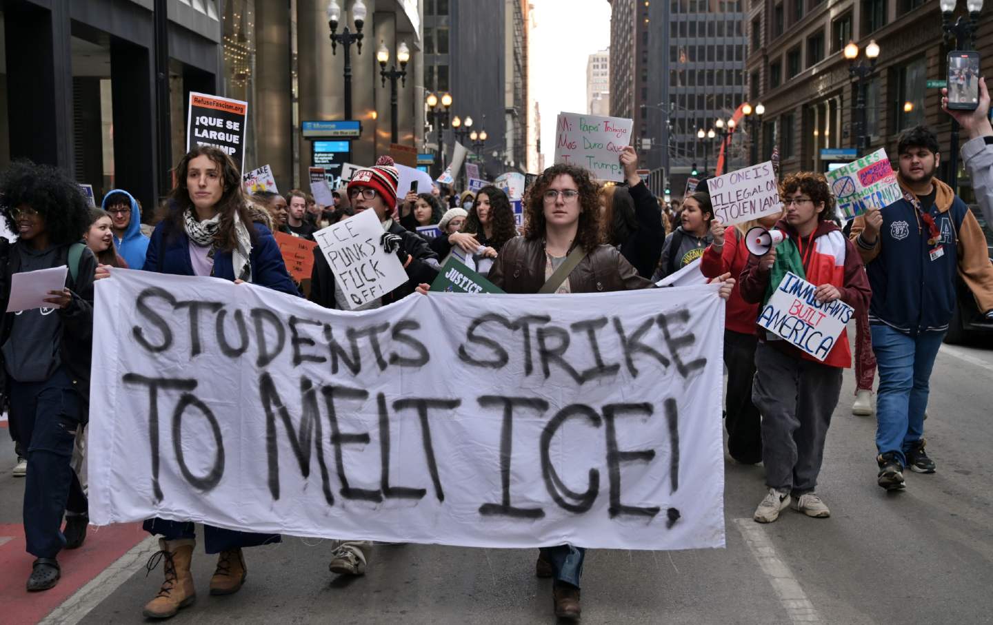 Students from across Chicago, including representatives from the School of the Art Institute of Chicago, gather to protest ICE.