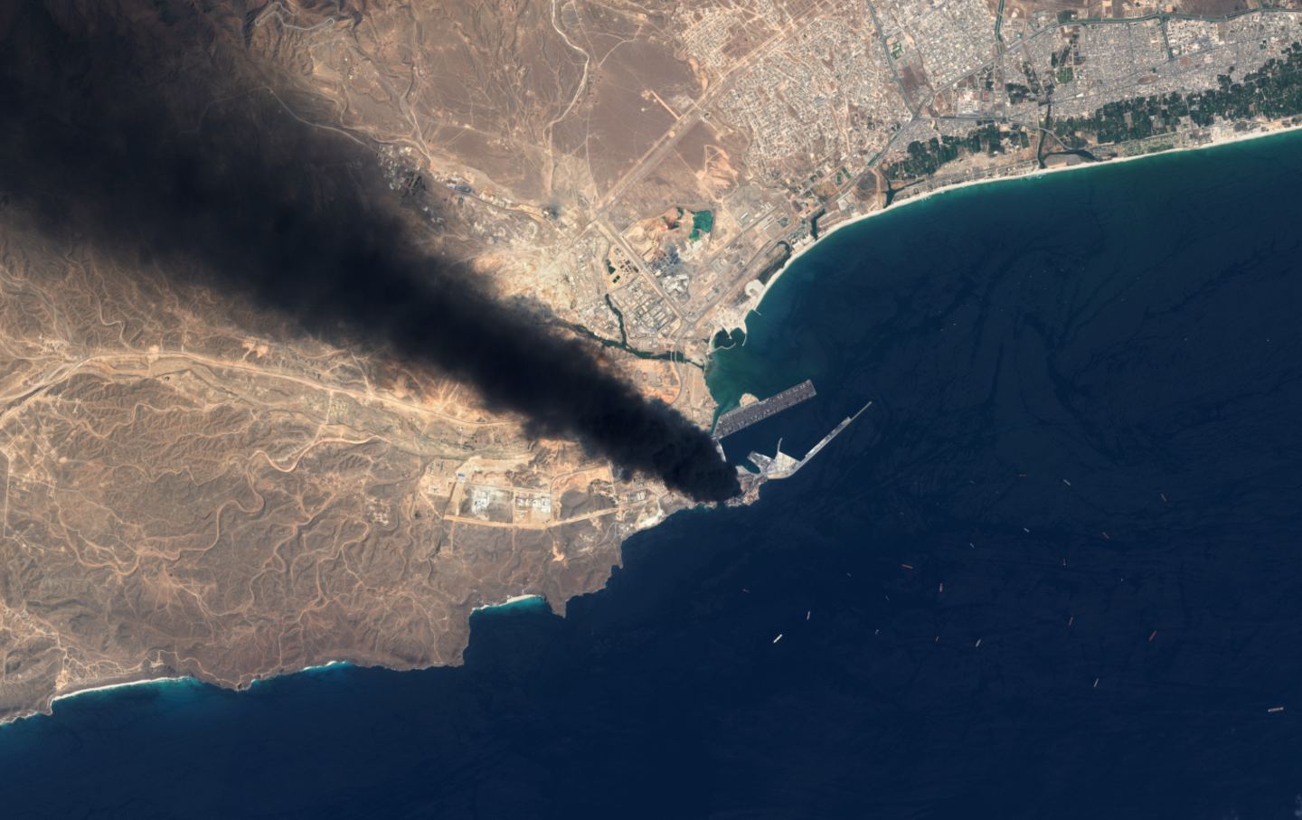 Satellite view of the Salalah oil storage fire after Iranian drone attack, on March 13, 2026.