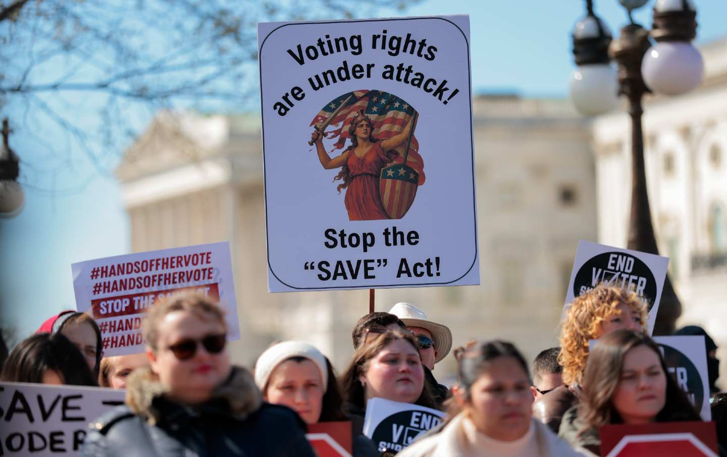 Demonstrators at a rally against the SAVE America Act outside the US Capitol