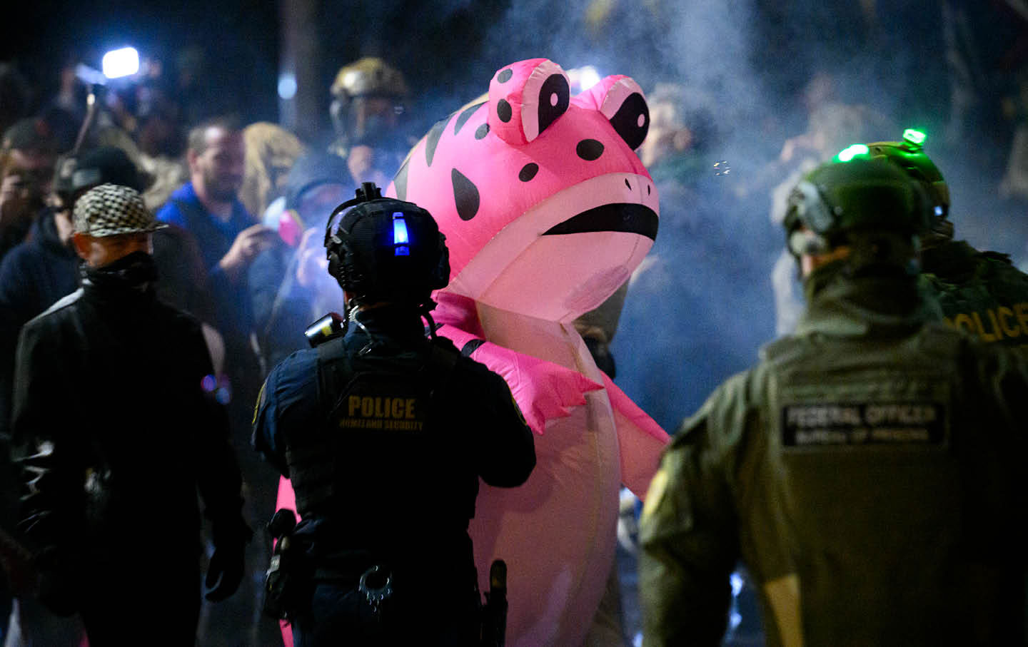 Anti-ICE protesters clash with federal agents at the Immigration and Customs Enforcement building in Portland, Oregon.