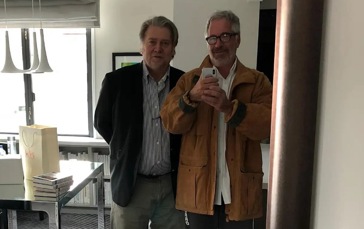Jeffrey Epstein and Steve Bannon, in a photo released by House Democrats.