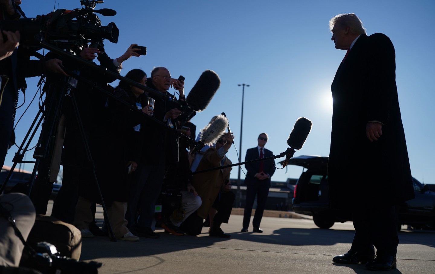 President Donald Trump speaks with the media after a visit to the Fort Bragg Army base on February 13, 2026, in Fort Bragg, North Carolina.