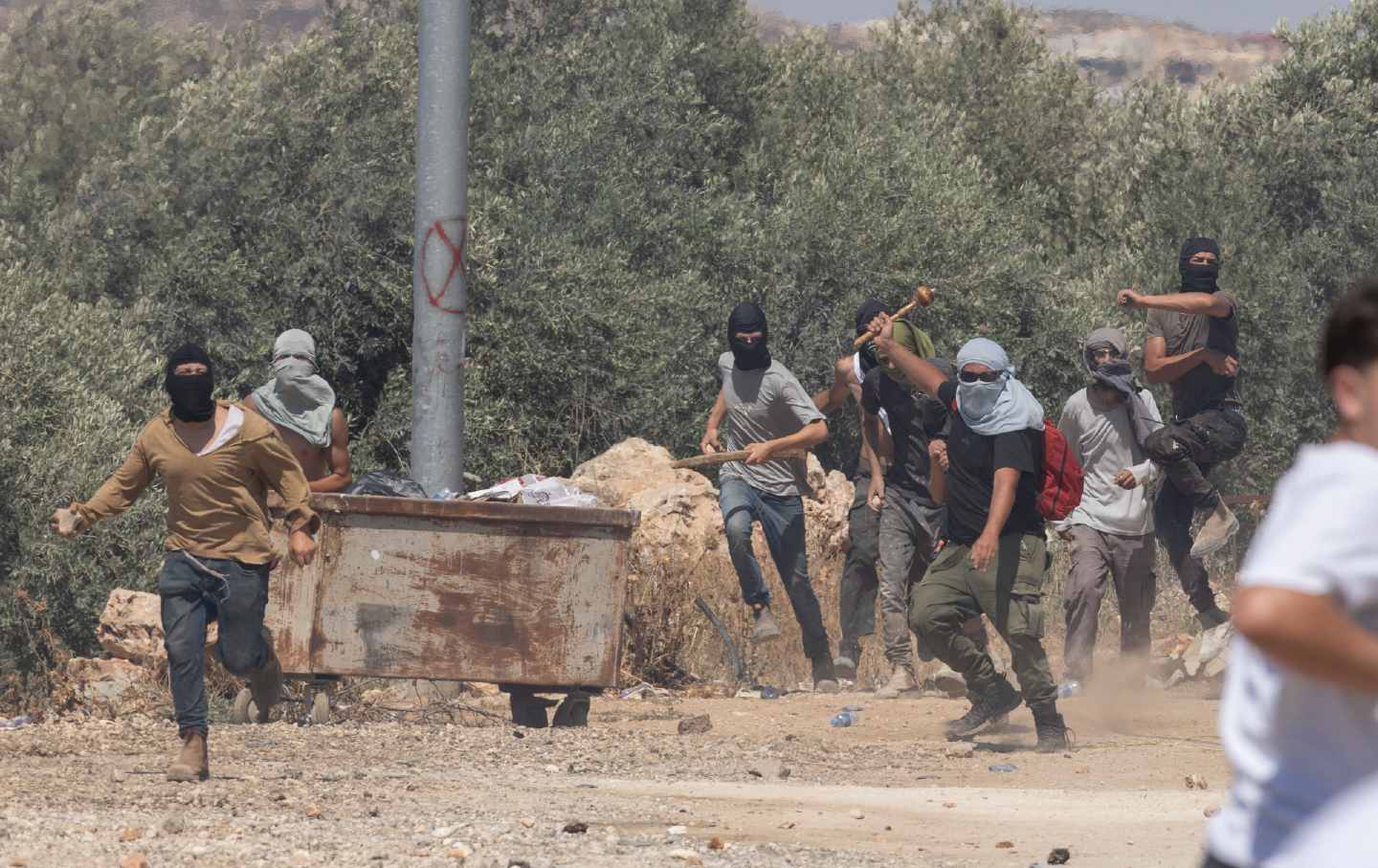 Israeli settlers attack the village of Turmus Ayya in the West Bank, June 26, 2025.