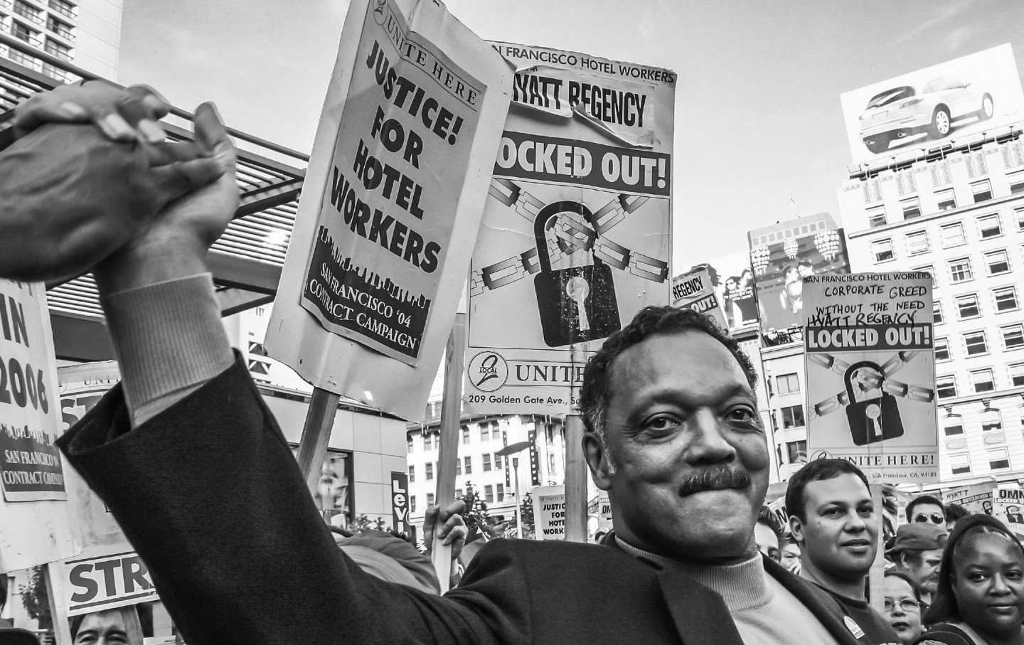Jesse Jackson marching with striking San Francisco hotel workers in 2004.