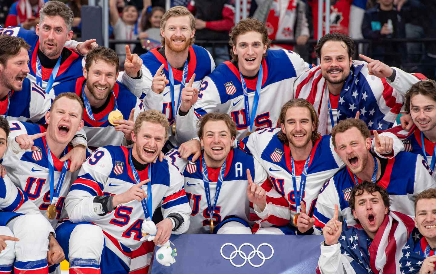 Team USA poses for after winning the men’s gold-medal hockey match between Canada and the United States on February 22, 2026, in Milan, Italy.